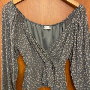 Gray cheetah print top from Vestique